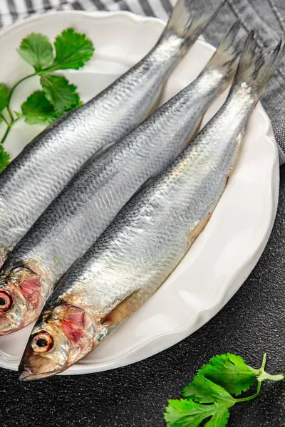 fresh herring fish raw seafood tasty fresh eating cooking meal food snack on the table copy space food background rustic top view Pescetarian diet