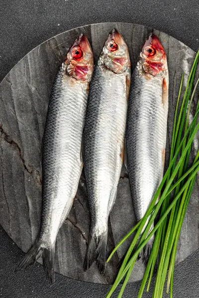 fish herring fresh raw seafood eating cooking meal food snack on the table copy space food background rustic top view