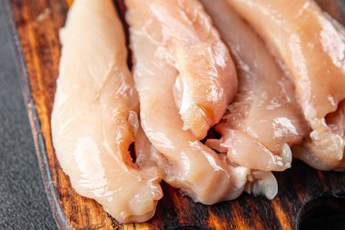 Çiğ tavuk eti hazır aperatifler masada atıştırmalıklar fotokopi uzayı arka plan kırsal üst görüş keto veya paleo diyeti