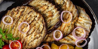 grilled vegetables eggplant, pepper, tomato fresh cooking appetizer meal food snack on the table copy space food background rustic top view keto or paleo diet vegetarian vegan food