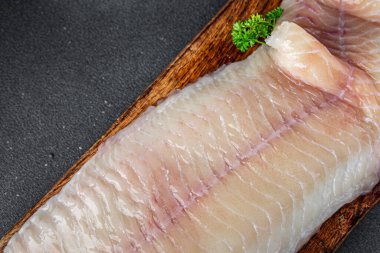 balık fileto çiğ beyaz deniz levreği taze yemek aperatifleri masa üzerinde fotokopi uzay yiyecek arka plan kırsal üst görünüm