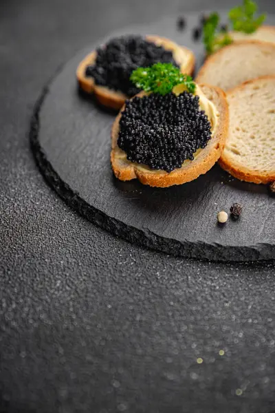 stock image lumpfish caviar seafood black caviar natural fresh appetizer meal food snack on the table copy space food background rustic top view