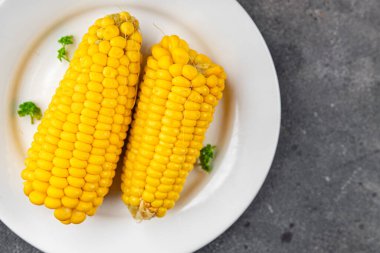 Haşlanmış mısır koçanı doğal yemek iştah açıcı yemek yemek aperatifi masa üzerinde fotokopi uzay yemek arka plan kırsal üst görüş keto veya paleo diyet vejetaryen vegan