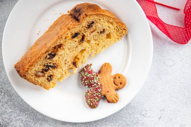 Panettone Noel pastası tatlı ürünler Noel arkaplanı Noel yemeği atıştırmalıkları fotokopi masasında uzay yiyecekleri arka plan kırsal manzarası