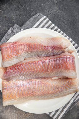 balık fileto çiğ beyaz balık morina ya da masa üzerinde taze yemek atıştırmalığı fotokopi uzay yiyecek arka plan kırsal üst görünüm 