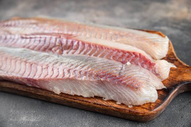 balık fileto çiğ beyaz balık morina ya da masa üzerinde taze yemek atıştırmalığı fotokopi uzay yiyecek arka plan kırsal üst görünüm 