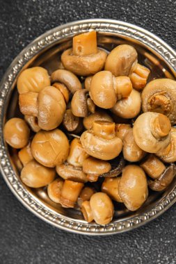 Champignon mantarı konserve ürünler lezzetli yemekler lezzetli gurme yemek arkaplan masadaki rustik yemekler fotokopi alanı üst görünüm keto ve paleo diyet vejetaryen ve vejetaryen yiyecekler