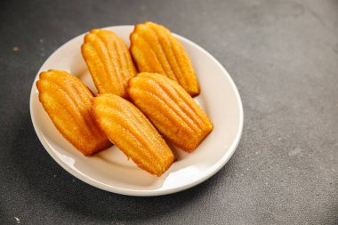 tatlı bisküvi Madeleine tatlı noel kurabiyesi taze lezzetli gurme yemek arkaplanı masa kırsal yemek üst görünüm fotokopi alanı