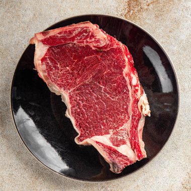 Çiğ biftek et taze yemek lezzetli gurme yemek arkaplan masa üzerinde yemek üst görünüm fotokopi uzay keto ve paleo diyet