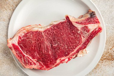 Çiğ biftek et taze yemek lezzetli gurme yemek arkaplan masa üzerinde yemek üst görünüm fotokopi uzay keto ve paleo diyet