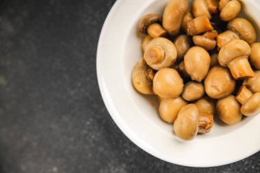 Champignon mantarı konserve ürünler lezzetli yemekler lezzetli gurme yemek arkaplan masadaki rustik yemekler fotokopi alanı üst görünüm keto ve paleo diyet vejetaryen ve vejetaryen yiyecekler