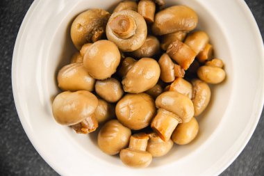 Champignon mantarı konserve ürünler lezzetli yemekler lezzetli gurme yemek arkaplan masadaki rustik yemekler fotokopi alanı üst görünüm keto ve paleo diyet vejetaryen ve vejetaryen yiyecekler