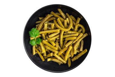 Lezzetli yemekler yemeye hazır yeşil fasulye. Lezzetli gurme yemek arkaplanı. Masanın üstünde.  