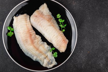 Çiğ balık fileto taze yemek lezzetli gurme yemek arkaplan masa üzerinde yemek üst görünüm fotokopi uzay keto ve paleo diyet pesseeter