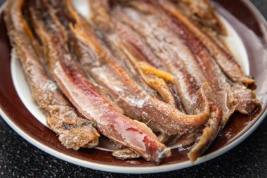 Ançüezli fileto balığı, deniz ürünleri aperatifler, lezzetli yemekler, lezzetli gurme yemek arka planı, masa sade yiyecekler, fotokopi alanı, pezeteryan diyeti.