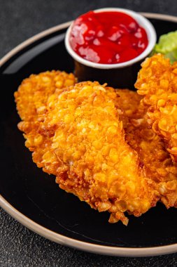 Tavuklu nuggetlar, kızarmış taze, lezzetli yemekler lezzetli gurme yemek arka planı, masa kırsal yiyeceklerin üst görüntüsü, fotokopi alanı.