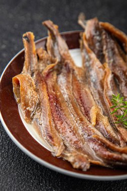 Ançüezli fileto balığı, deniz ürünleri aperatifler, lezzetli yemekler, gurme yemek arka planı, masa sade yiyecekler, fotokopi alanı, pezeteryan diyeti.