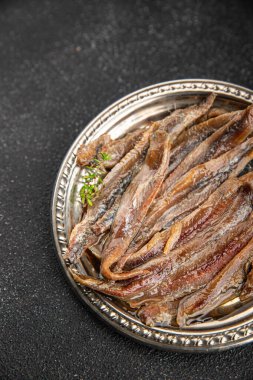 Ançüezli fileto balığı, deniz ürünleri aperatifler, lezzetli yemekler, gurme yemek arka planı, masa sade yiyecekler, fotokopi alanı, pezeteryan diyeti.