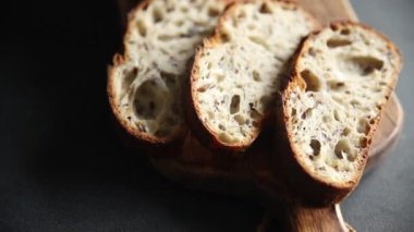 Tahıl ekmeği ayçiçeği, çim, keten tohumu, yulaf ezmesi taze lezzetli yemekler lezzetli gurme yemek arkaplan masanın üstünde rustik yiyecekler fotokopi alanı vejetaryen ve vejetaryen yemekleri