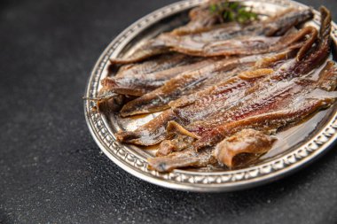 Ançüezli fileto balığı, deniz ürünleri aperatifler, lezzetli yemekler, lezzetli gurme yemek arka planı, masa sade yiyecekler, fotokopi alanı, pezeteryan diyeti.