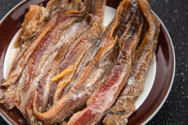 Ançüezli fileto balığı, deniz ürünleri aperatifler, lezzetli yemekler, lezzetli gurme yemek arka planı, masa sade yiyecekler, fotokopi alanı, pezeteryan diyeti.