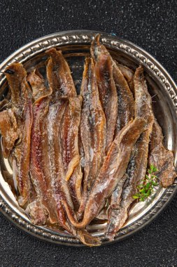 Ançüezli fileto balığı, deniz ürünleri aperatifler, lezzetli yemekler, lezzetli gurme yemek arka planı, masa sade yiyecekler, fotokopi alanı, pezeteryan diyeti.