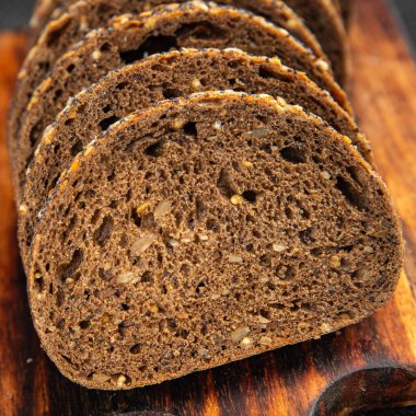 Tahıl ekmeği, tahıl ekmeği, ekmek dilimi taze yemek, gurme yemek arkaplanı, kırsal yiyecekler, fotokopi alanı.