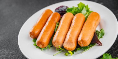 Sosisler et lezzetli lezzetli gurme yemek arka plan masa sade yemek üst manzara fotokopi alanı