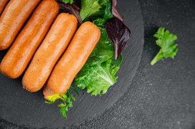 Sosisler et lezzetli lezzetli gurme yemek arka plan masa sade yemek üst manzara fotokopi alanı