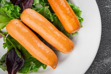 Sosisler et lezzetli lezzetli gurme yemek arka plan masa sade yemek üst manzara fotokopi alanı