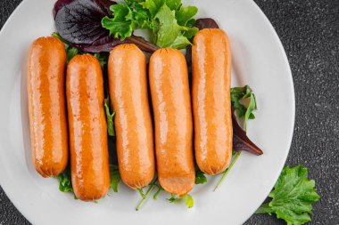 Sosisler et lezzetli lezzetli gurme yemek arka plan masa sade yemek üst manzara fotokopi alanı