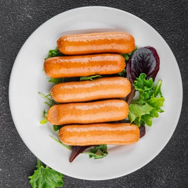 Sosisler et lezzetli lezzetli gurme yemek arka plan masa sade yemek üst manzara fotokopi alanı