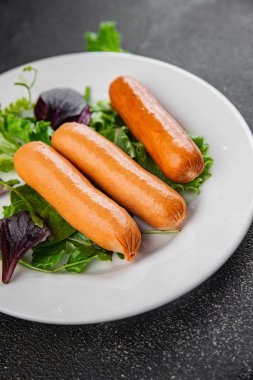 Sosisler et lezzetli lezzetli gurme yemek arka plan masa sade yemek üst manzara fotokopi alanı