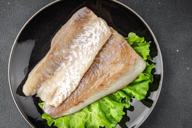 Beyaz balıklı fileto çiğ deniz ürünleri taze lezzetli yemekler lezzetli gurme yemek arka planda sofrada kırsal yiyecekler üst görünümde fotokopi alanı pesseeter diyet