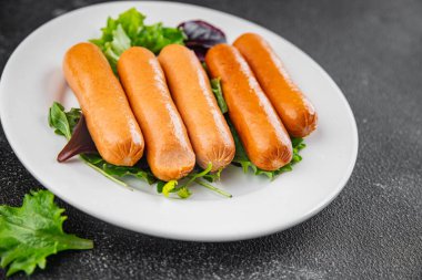 Sosisler et lezzetli lezzetli gurme yemek arka plan masa sade yemek üst manzara fotokopi alanı