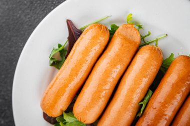 Sosisler et lezzetli lezzetli gurme yemek arka plan masa sade yemek üst manzara fotokopi alanı