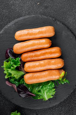 Sosisler et lezzetli lezzetli gurme yemek arka plan masa sade yemek üst manzara fotokopi alanı