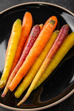 Havuç renginde taze sebze, lezzetli gurme, arka plan, masa üstü yemekler, fotokopi odası keto, paleo diyet vejetaryen ve vejetaryen yemekleri.