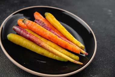 Havuç renginde taze sebze, lezzetli gurme, arka plan, masa üstü yemekler, fotokopi odası keto, paleo diyet vejetaryen ve vejetaryen yemekleri.