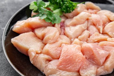 Tavuk, çiğ et, kümes hayvanları lezzetli lezzetli lezzetli gurme yemek arkaplanı, masa rustik gıdalar, fotokopi alanı ve paleo diyeti.