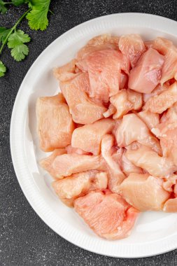 Tavuk, çiğ et, kümes hayvanları lezzetli lezzetli lezzetli gurme yemek arkaplanı, masa rustik gıdalar, fotokopi alanı ve paleo diyeti.