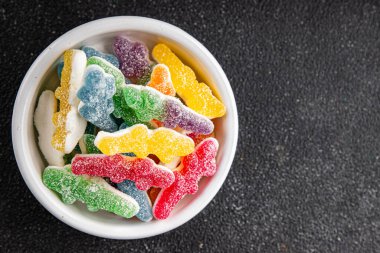 Jöleli şeker, tatlı, lezzetli gurme yemek arka planı, masa rustik yemekler, fotokopi alanı vejetaryen ve vejetaryen yemekleri.