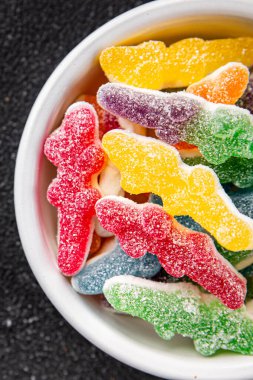 Jöleli şeker, tatlı, lezzetli gurme yemek arka planı, masa rustik yemekler, fotokopi alanı vejetaryen ve vejetaryen yemekleri.