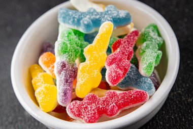 Jöleli şeker, tatlı, lezzetli gurme yemek arka planı, masa rustik yemekler, fotokopi alanı vejetaryen ve vejetaryen yemekleri.