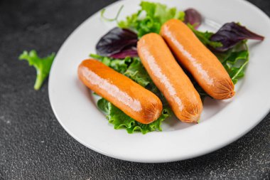 Sosisler et lezzetli lezzetli gurme yemek arka plan masa sade yemek üst manzara fotokopi alanı