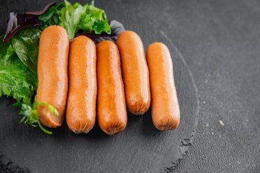 Sosisler et lezzetli lezzetli gurme yemek arka plan masa sade yemek üst manzara fotokopi alanı