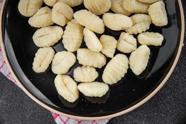 Gnocchi lezzetli lezzetli lezzetli gurme yemek masa arkası yemek üst görünüm uzay keto ve paleo diyet vejetaryen ve vejetaryen gıda
