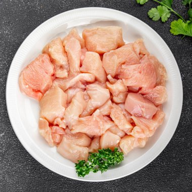 Tavuk, çiğ et, kümes hayvanları lezzetli lezzetli lezzetli gurme yemek arkaplanı, masa rustik gıdalar, fotokopi alanı ve paleo diyeti.