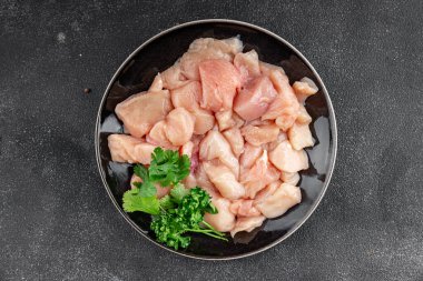 Tavuk, çiğ et, kümes hayvanları lezzetli lezzetli lezzetli gurme yemek arkaplanı, masa rustik gıdalar, fotokopi alanı ve paleo diyeti.