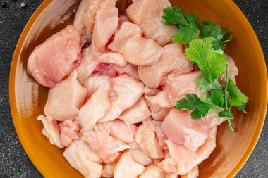 Tavuk, çiğ et, kümes hayvanları lezzetli lezzetli lezzetli gurme yemek arkaplanı, masa rustik gıdalar, fotokopi alanı ve paleo diyeti.